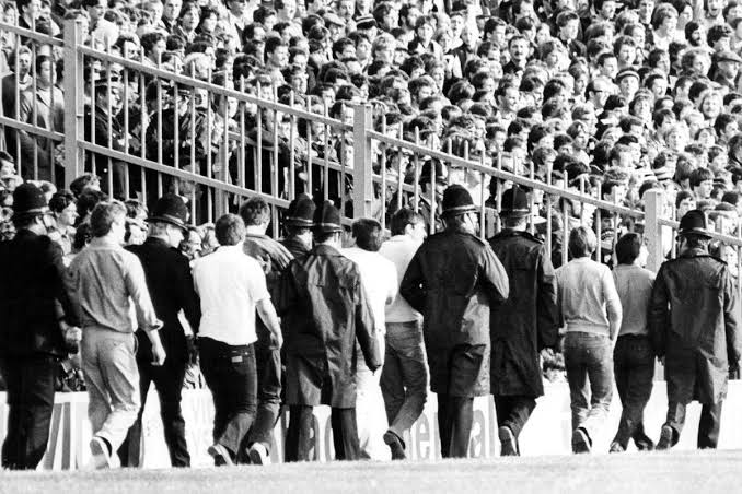 fotball hooligans walking round stadium